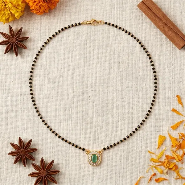 Elegant_Gold_Plated_Emerald_Oval_Pendant_Mangalsutra_With_Cz_Accents