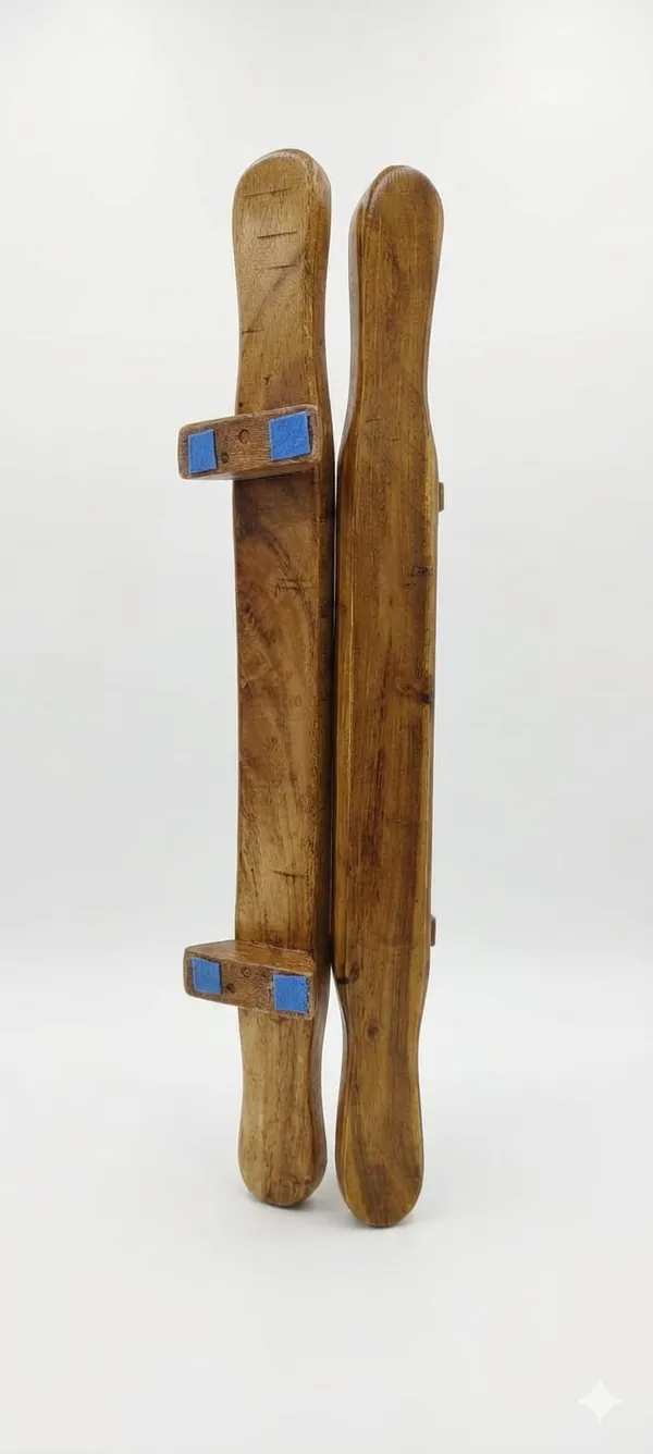Wooden_Pair_Of_Skis_With_Blue_Straps