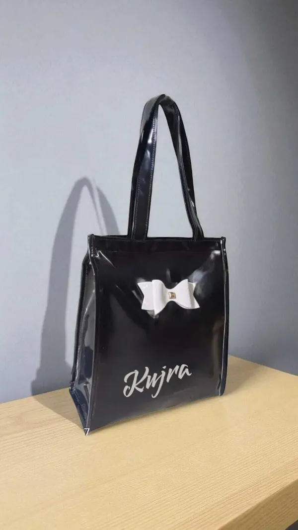 KujrAEnterprise_Stylish_Women’s_Tote_Handbag_with_Bow_Design_|_Glossy_Finish_Shoulder_Bag_Waterproof_Shoulder_Bag_(Black,_30_L)