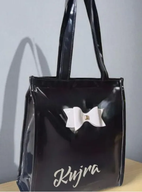 KujrAEnterprise_Stylish_Women’s_Tote_Handbag_with_Bow_Design_|_Glossy_Finish_Shoulder_Bag_Waterproof_Shoulder_Bag_(Black,_30_L)
