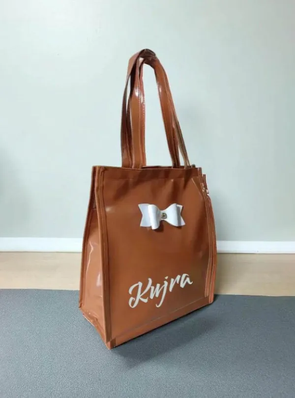 KujrAEnterprise_Stylish_Women’s_Tote_Handbag_with_Bow_Design_|_Glossy_Finish_Shoulder_Bag_Waterproof_Shoulder_Bag_(Brown,_30_L)