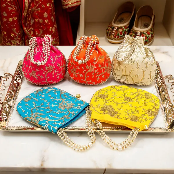 Traditional_Embroidered_Potli_Bags_Combo_Set_-_Silk_Drawstring_Batua_Purse_with_Pearl_Handle_for_Women,_Wedding_Favor_&_Festive_Gifting_(Assorted_Colors)