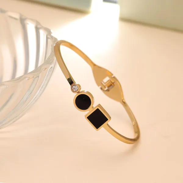 Gold-Tone_Black_Stone_Open_Kada_Bracelet_for_Women_|_Modern_Designer_Bangle