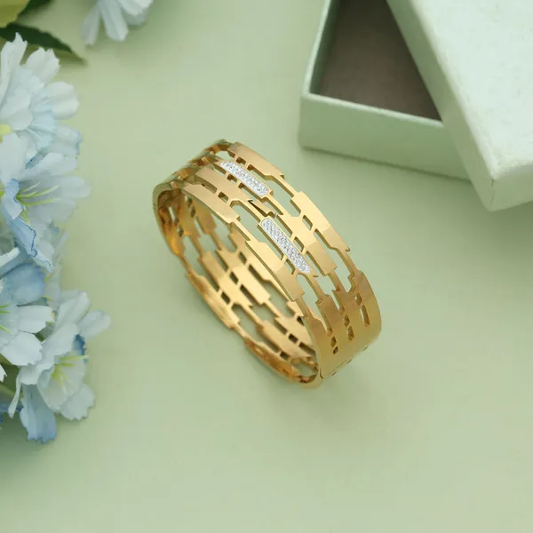Golden_Geometric_Cutwork_Bracelet_with_Crystal_Detailing