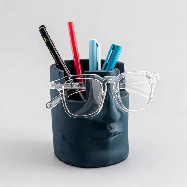 Correa_Studio_Navy_Blue_Jesmonite_Sculptural_Face_Pen_Stand