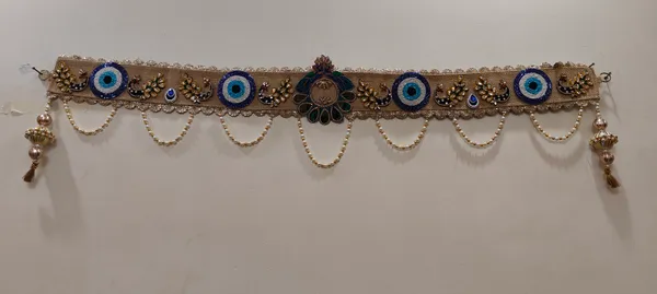 Jute_Base_With_Peacock_And_Evil_Eye_Dwar_Toran