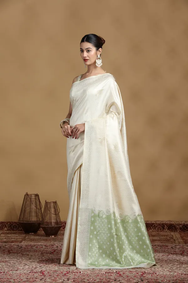 Off_White_Banarasi_Silk_Saree_With_Subtle_Pastel_Green_Border_Default_Title