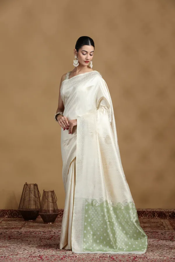 Off_White_Banarasi_Silk_Saree_With_Subtle_Pastel_Green_Border_Default_Title