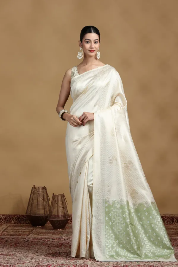 Off_White_Banarasi_Silk_Saree_With_Subtle_Pastel_Green_Border_Default_Title