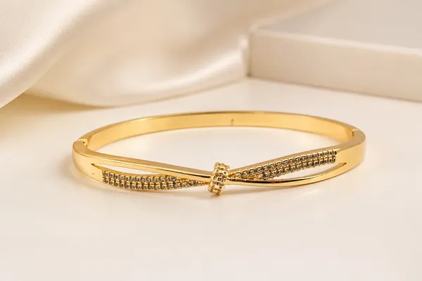Gold_Tone_Crystal_Embellished_Bangle_For_Women