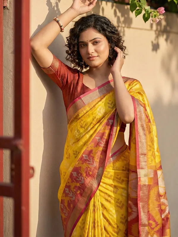 Mustard_Yellow_Patola_Inspired_Woven_Maroon_Contrast_Tassel_Pallu_Saree_For_Women