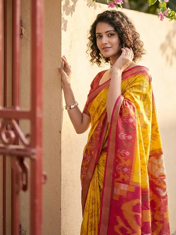 Mustard_Yellow_Patola_Inspired_Woven_Maroon_Contrast_Tassel_Pallu_Saree_For_Women