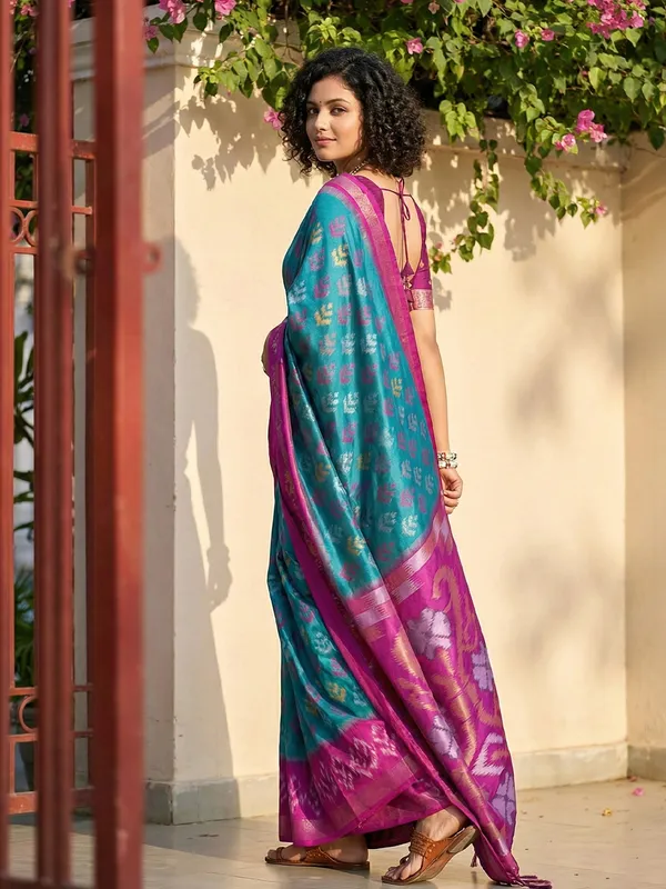 Teal_Blue_Patola_Silk_Woven_Saree_Magenta_Contrast_Border_For_Women