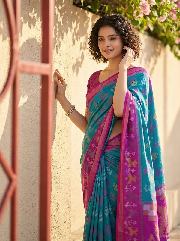 Teal_Blue_Patola_Silk_Woven_Saree_Magenta_Contrast_Border_For_Women