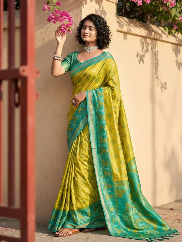 Lime_Yellow_Patola_Silk_Woven_Teal_Border_Tassel_Pallu_Saree_For_Women