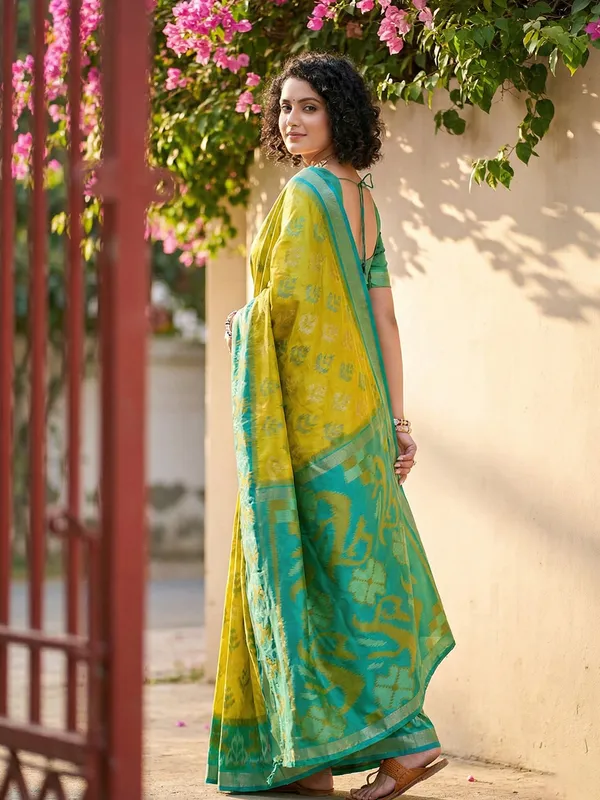 Lime_Yellow_Patola_Silk_Woven_Teal_Border_Tassel_Pallu_Saree_For_Women
