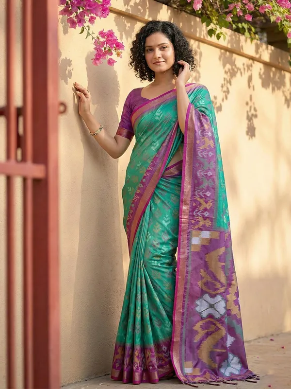 Sea_Green_Patola_Inspired_Woven_Purple_Contrast_Tassel_Pallu_Saree_For_Women