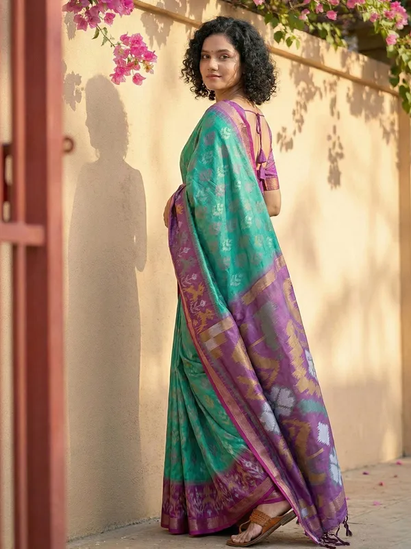 Sea_Green_Patola_Inspired_Woven_Purple_Contrast_Tassel_Pallu_Saree_For_Women