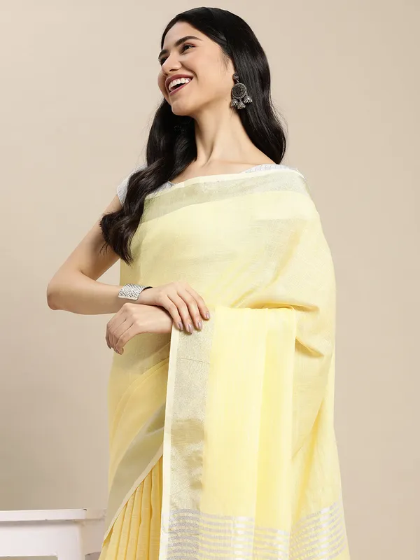 Pastel_Yellow_Linen_Silver_Stripe_Border_Saree_For_Women