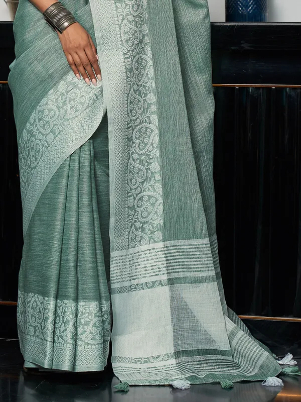 Teal_Green_Silver_Linen_Blend_Woven_Design_Saree_For_Women