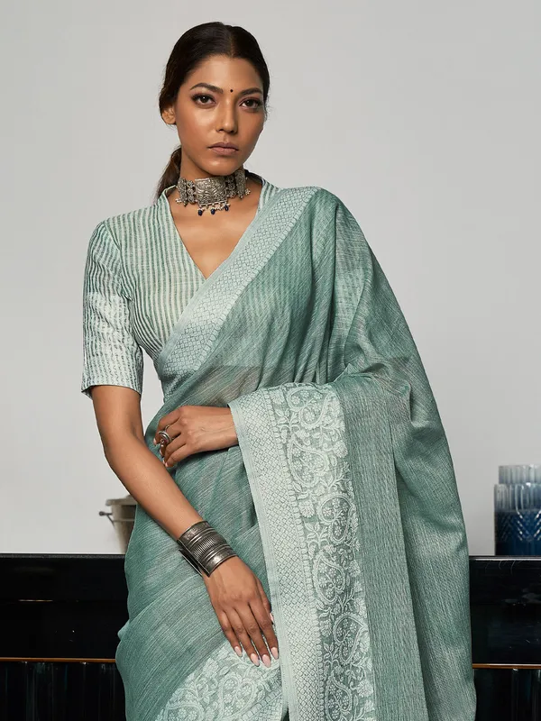 Teal_Green_Silver_Linen_Blend_Woven_Design_Saree_For_Women
