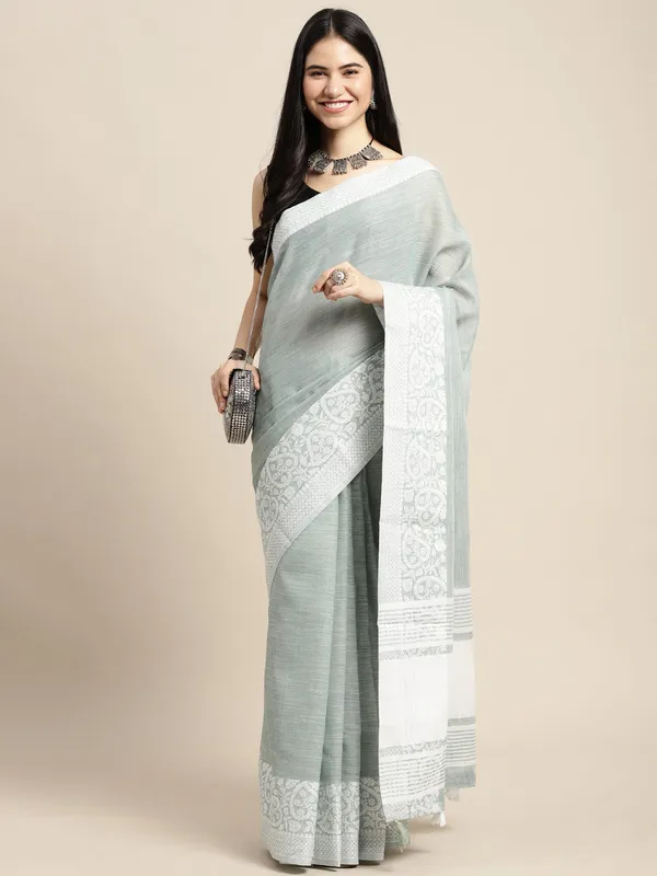 Teal_Green_Silk_Silver_Toned_Woven_Saree_For_Women