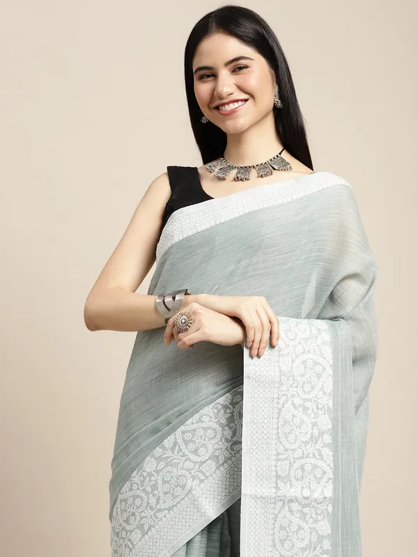 Teal_Green_Silk_Silver_Toned_Woven_Saree_For_Women