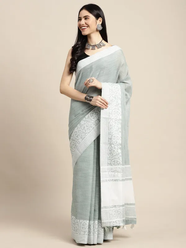 Teal_Green_Silk_Silver_Toned_Woven_Saree_For_Women