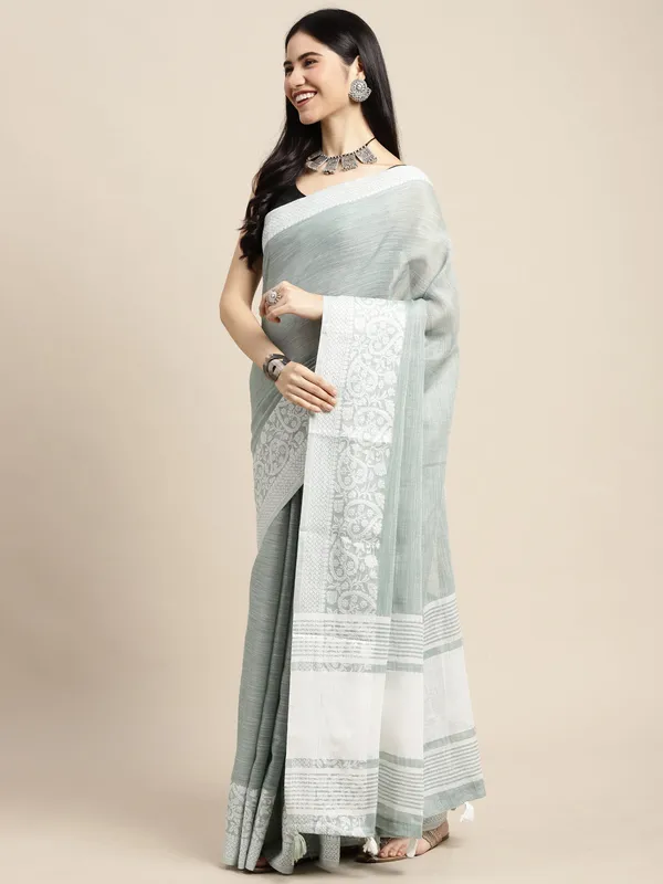 Teal_Green_Silk_Silver_Toned_Woven_Saree_For_Women