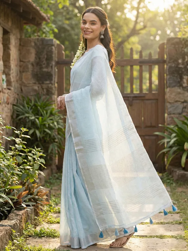 Sky_Blue_Linen_Woven_Zari_Border_Tassel_Saree_For_Women