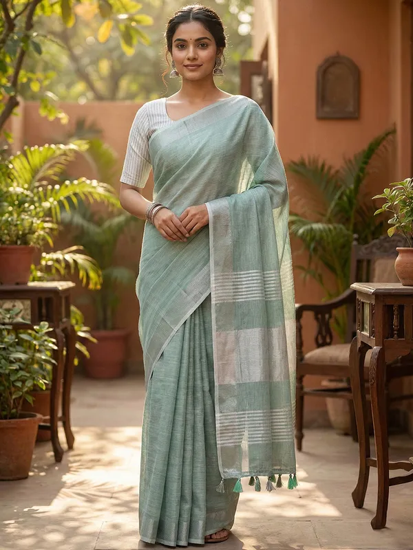 Sea_Green_Linen_Woven_Zari_Border_Tassel_Saree_For_Women