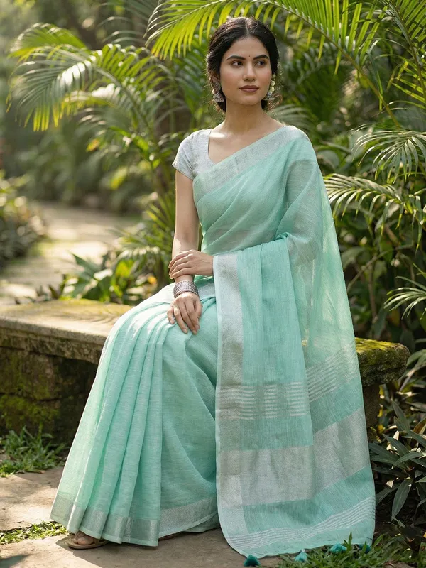Turquoise_Linen_Woven_Saree_Zari_Border_Tassel_For_Women