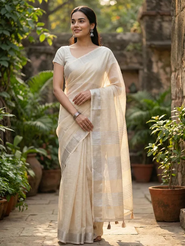 Beige_Linen_Woven_Saree_Zari_Border_Tassel_For_Women