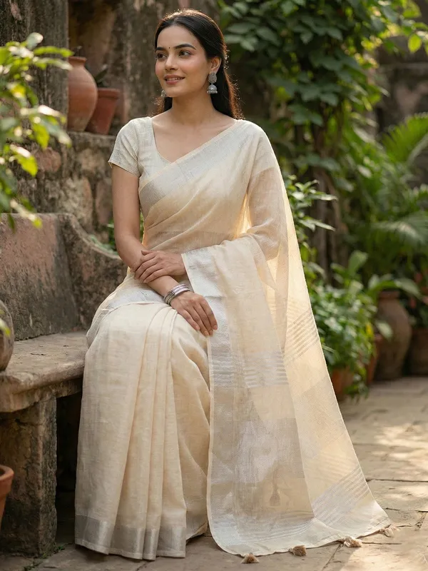 Beige_Linen_Woven_Saree_Zari_Border_Tassel_For_Women