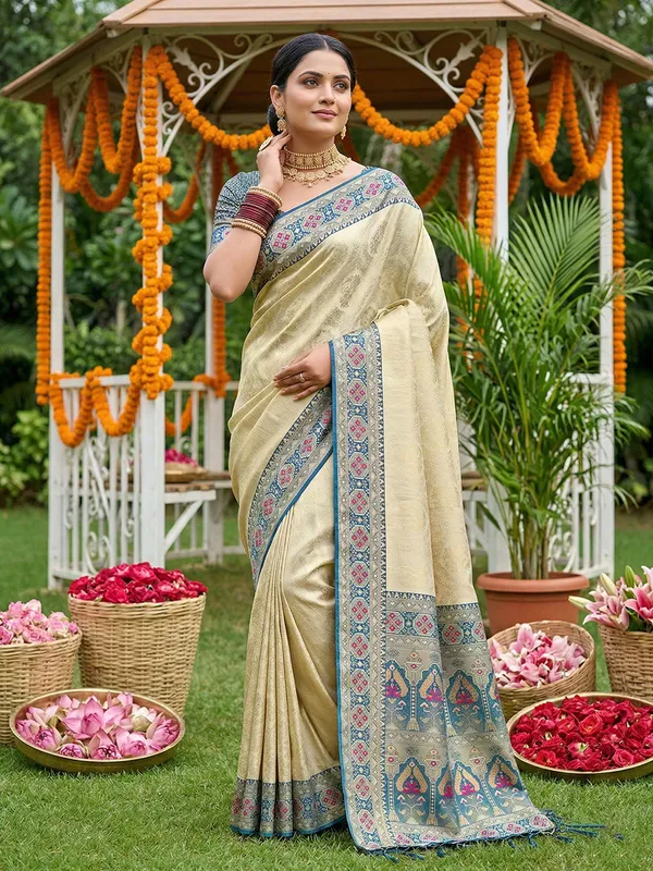 Cream_Teal_Kanjivaram_Soft_Silk_Zari_Border_Paisley_Pallu_Saree_For_Women