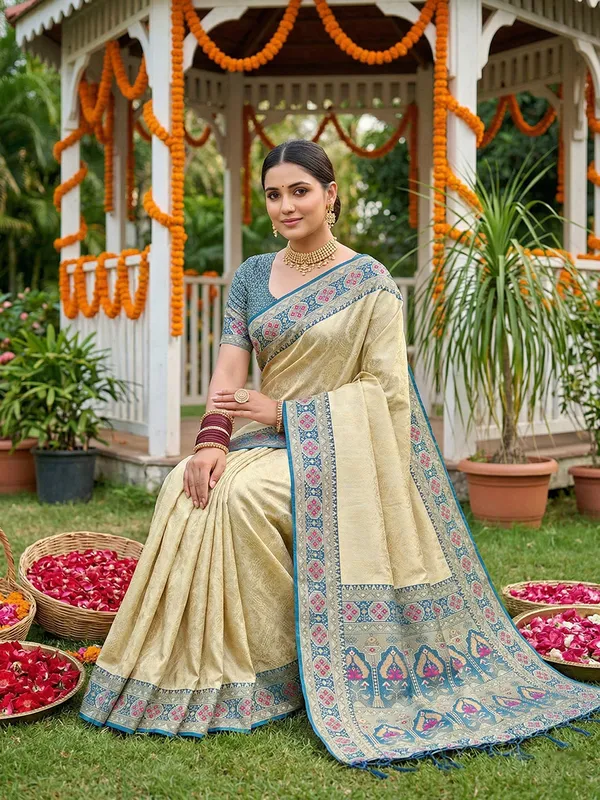 Cream_Teal_Kanjivaram_Soft_Silk_Zari_Border_Paisley_Pallu_Saree_For_Women