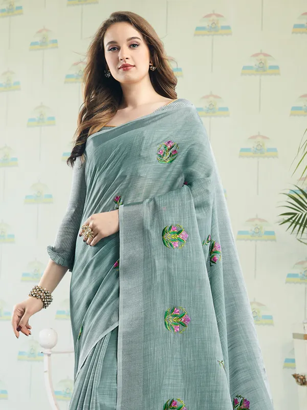 Sea_Green_Linen_Floral_Embroidery_Tassel_Saree_For_Women