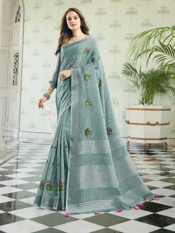 Sea_Green_Linen_Floral_Embroidery_Tassel_Saree_For_Women