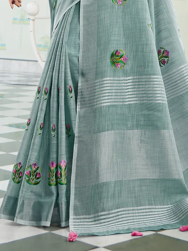 Sea_Green_Linen_Floral_Embroidery_Tassel_Saree_For_Women
