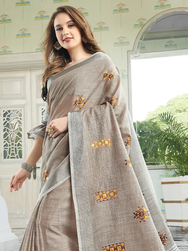 Brown_Linen_Floral_Embroidery_Border_Tassel_Saree_For_Women
