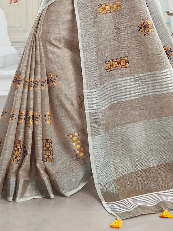Brown_Linen_Floral_Embroidery_Border_Tassel_Saree_For_Women