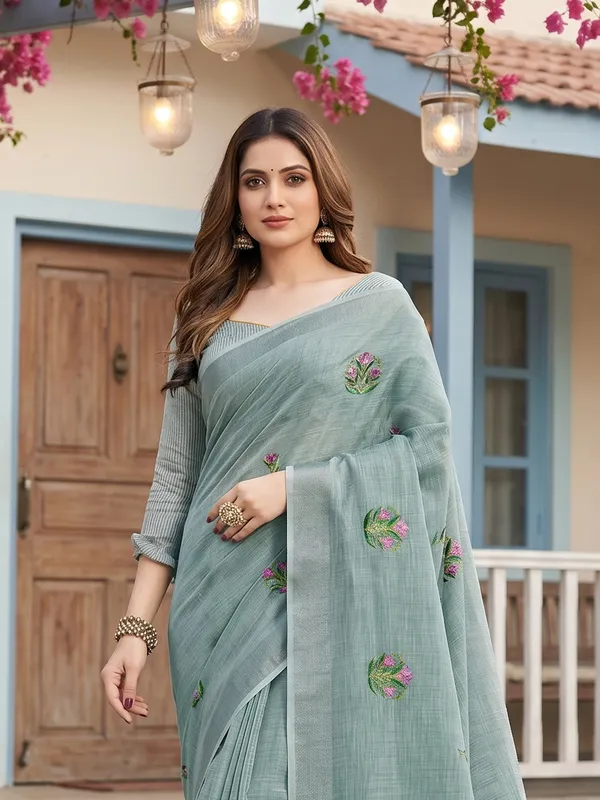 Sea_Green_Linen_Floral_Embroidery_Tassel_Border_Saree_For_Women