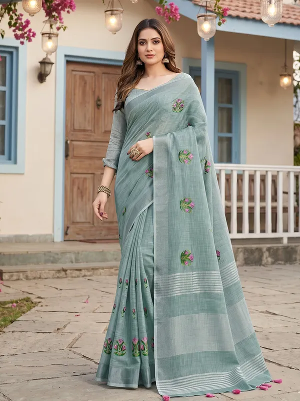 Sea_Green_Linen_Floral_Embroidery_Tassel_Border_Saree_For_Women