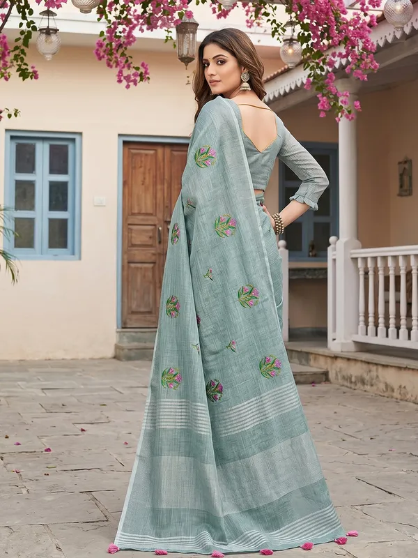 Sea_Green_Linen_Floral_Embroidery_Tassel_Border_Saree_For_Women