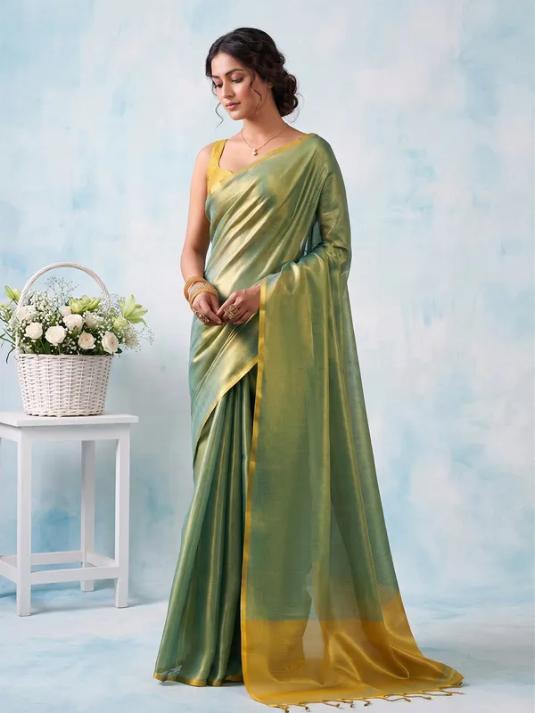 Teal_Green_Tissue_Silk_Solid_Zari_Border_Saree_For_Women