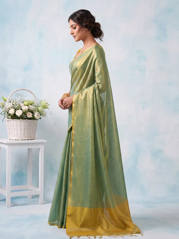 Teal_Green_Tissue_Silk_Solid_Zari_Border_Saree_For_Women