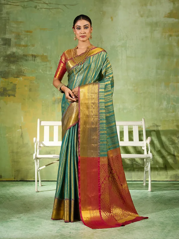 Teal_Green_Kanjivaram_Silk_Gold_Stripe_Saree_For_Women