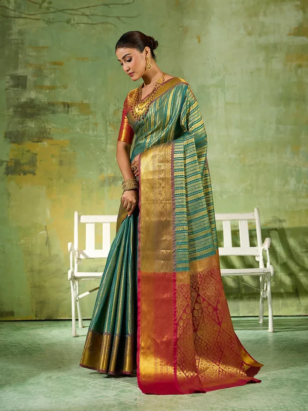 Teal_Green_Kanjivaram_Silk_Gold_Stripe_Saree_For_Women