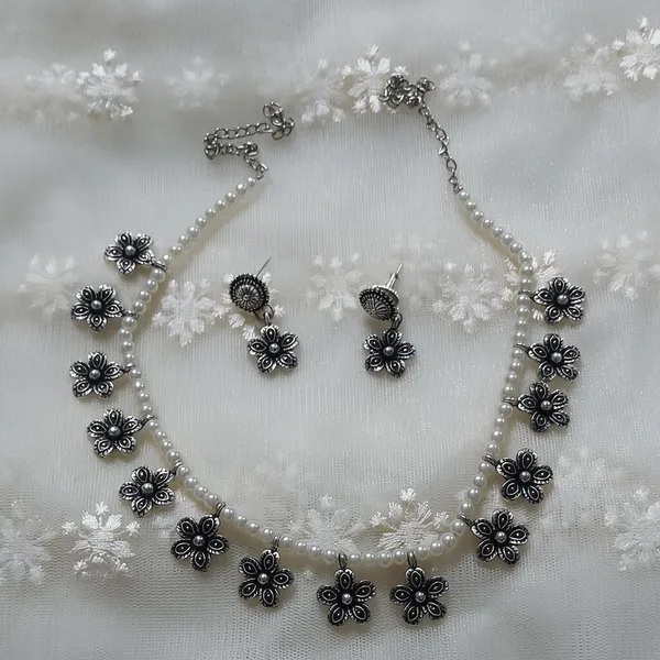 Silver_Oxidized_Floral_Pearl_Necklace_And_Earrings_Set_For_Women