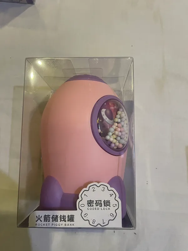 Pink_Plastic_Rocket_Shaped_Coded_Lock_Piggy_Bank_For_Kids